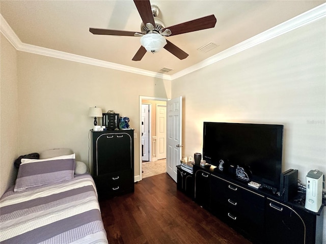 3488 NW 26th St, Gainesville, FL 32605 - bedroom featuring dark wood-type flooring, ornamental molding, and visible vents