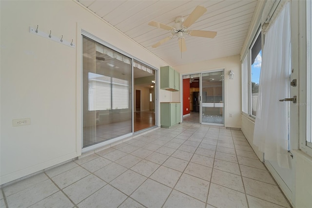 882 Tanglewood Pl, The Villages, FL 32162 - spare room featuring light tile patterned flooring, ceiling fan, baseboards, and a wealth of natural light