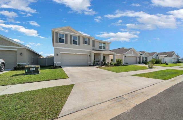 traditional home with driveway, stucco siding, a front lawn, a garage, and a residential view