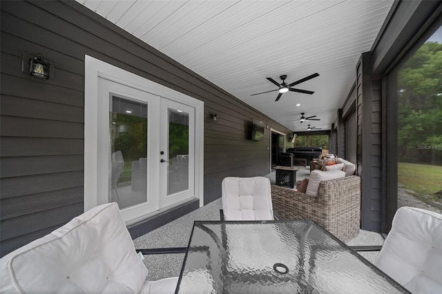 view of patio featuring french doors and ceiling fan