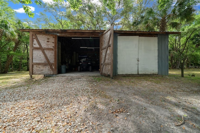 view of outbuilding featuring an outdoor structure