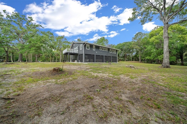 view of yard featuring a sunroom