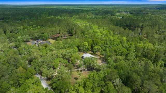 aerial view with a wooded view