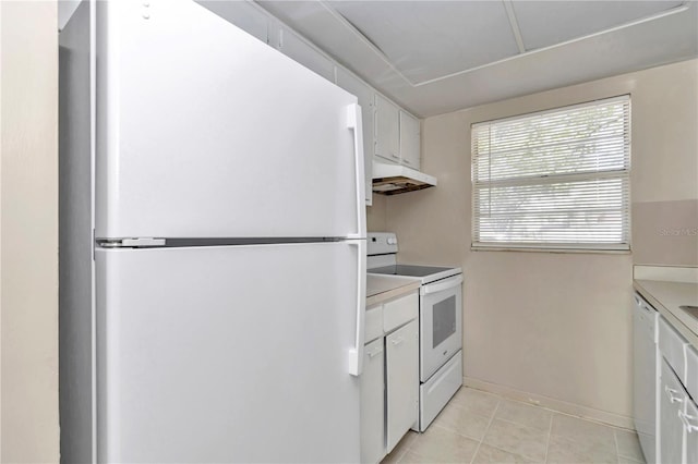 kitchen featuring white appliances, light tile patterned floors, white cabinetry, light countertops, and under cabinet range hood