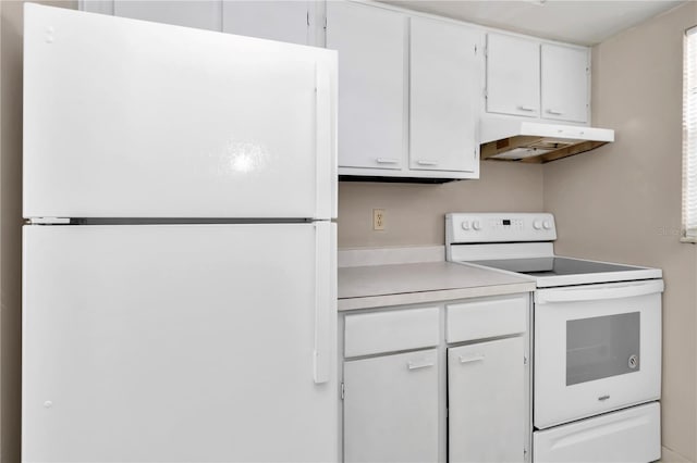 kitchen featuring light countertops, white cabinetry, white appliances, and under cabinet range hood
