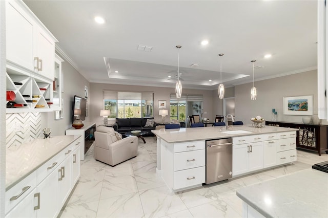 kitchen featuring dishwasher, marble finish floor, a tray ceiling, and a sink