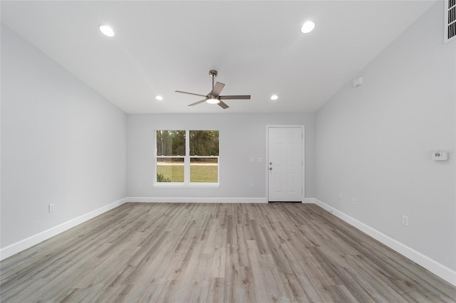 15840 SW 38th Pl, Ocala, FL 34481 - unfurnished living room featuring ceiling fan, recessed lighting, baseboards, and light wood finished floors