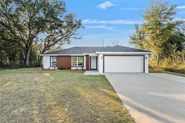 15854 SW 38th Pl, Ocala, FL 34481 - ranch-style home with roof with shingles, stucco siding, driveway, a front yard, and a garage