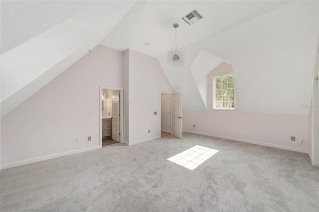 1251 SW 43rd Pl, Ocala, FL 34471 - additional living space with light carpet, vaulted ceiling, and baseboards