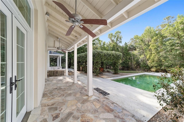1251 SW 43rd Pl, Ocala, FL 34471 - view of patio / terrace featuring a ceiling fan, french doors, and an outdoor pool