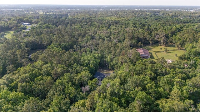 1251 SW 43rd Pl, Ocala, FL 34471 - aerial view of property and surrounding area with a heavily wooded area