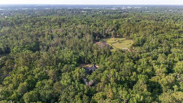 1251 SW 43rd Pl, Ocala, FL 34471 - aerial view of property and surrounding area with a heavily wooded area