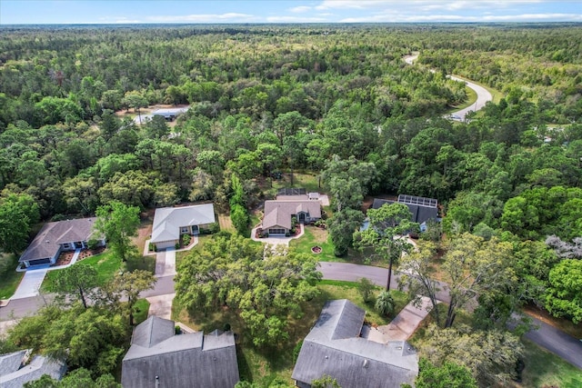 bird's eye view featuring a view of trees