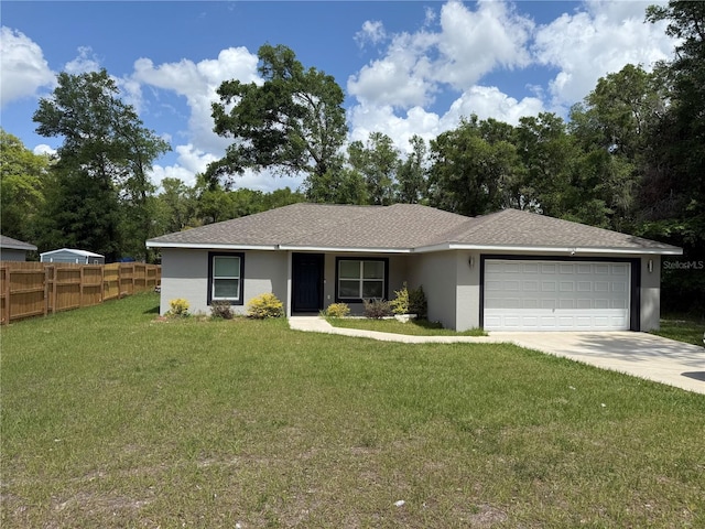single story home with a garage, fence, stucco siding, a front lawn, and driveway