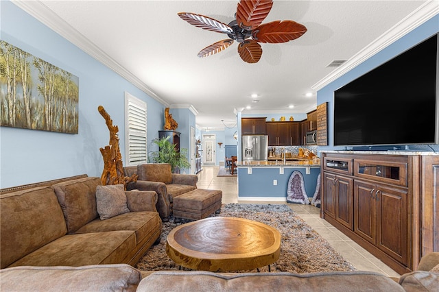 5220 Sunshine Dr, Wildwood, FL 34785 - living room featuring crown molding, ceiling fan, light tile patterned floors, and recessed lighting