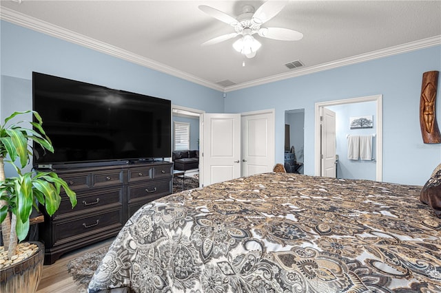 5220 Sunshine Dr, Wildwood, FL 34785 - bedroom featuring wood finished floors, visible vents, ornamental molding, and ceiling fan