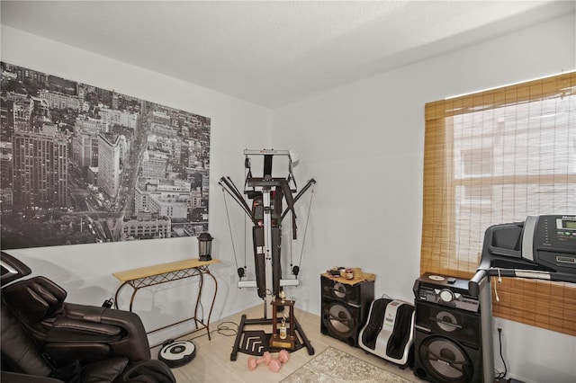 exercise area with tile patterned floors