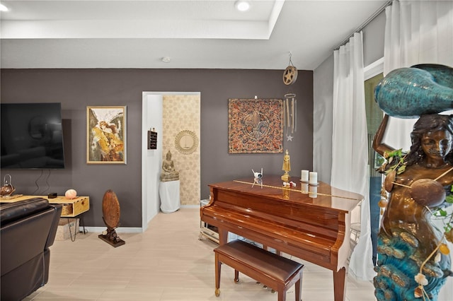 living area with recessed lighting and baseboards