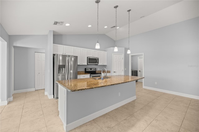 kitchen with light tile patterned floors, white cabinets, visible vents, appliances with stainless steel finishes, and a sink