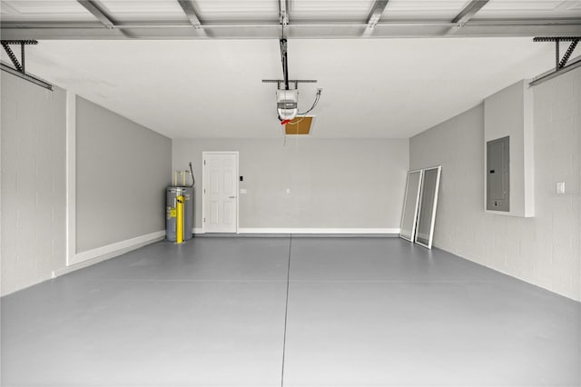 garage featuring a garage door opener, electric panel, and electric water heater