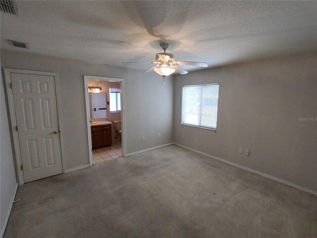 10315 SW 62nd Terrace Rd, Ocala, FL 34476 - unfurnished bedroom featuring multiple windows, light colored carpet, and baseboards