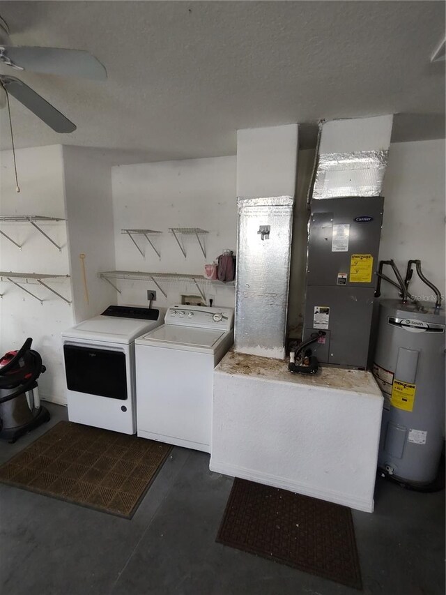 10315 SW 62nd Terrace Rd, Ocala, FL 34476 - laundry room featuring water heater, washing machine and dryer, and ceiling fan