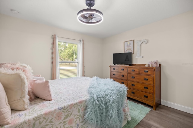 77 Locust Dr, Ocala, FL 34472 - bedroom featuring wood finished floors and baseboards