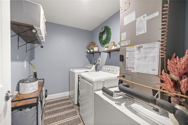 77 Locust Dr, Ocala, FL 34472 - clothes washing area featuring separate washer and dryer, laundry area, heating unit, and baseboards