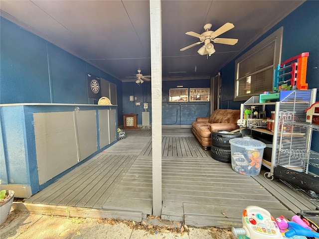 exterior space with a ceiling fan