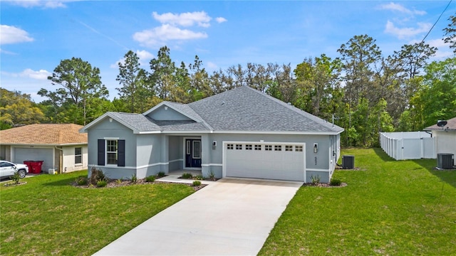 ranch-style house with roof with shingles, an attached garage, stucco siding, driveway, and central air condition unit
