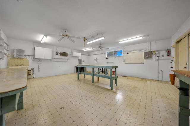 interior space with ceiling fan and light floors