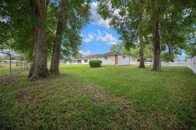 view of yard featuring fence