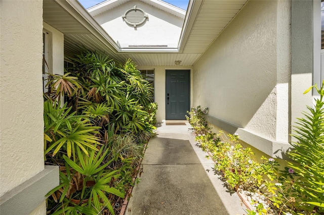 15426 SW 14th Avenue Rd, Ocala, FL 34473 - view of exterior entry featuring stucco siding