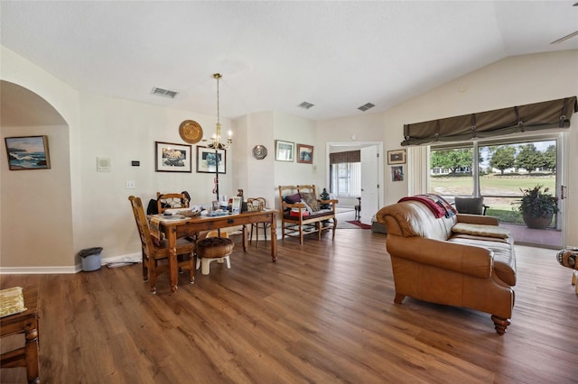 15426 SW 14th Avenue Rd, Ocala, FL 34473 - living room featuring visible vents, arched walkways, and wood finished floors