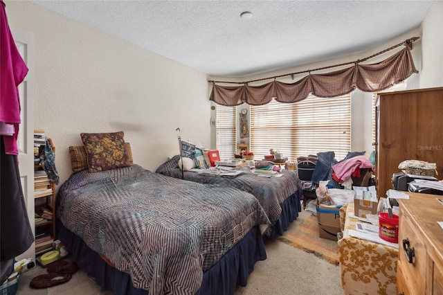 15426 SW 14th Avenue Rd, Ocala, FL 34473 - carpeted bedroom featuring a textured ceiling