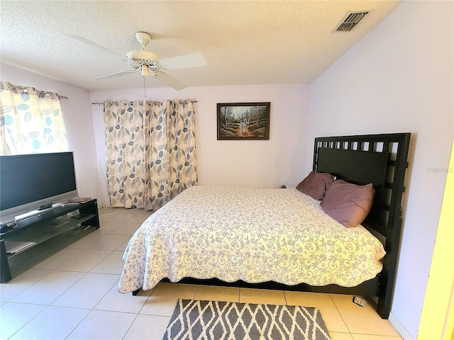 5606 SW 107th St, Ocala, FL 34476 - tiled bedroom featuring visible vents, a ceiling fan, and a textured ceiling