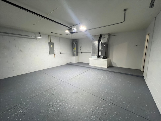 38 Laurel Ct, Ocala, FL 34480 - garage with electric panel, heating unit, water heater, concrete block wall, and a garage door opener