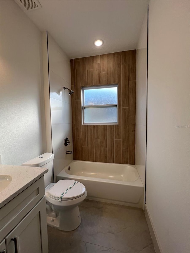1581 W Saint Elizabeth Pl, Citrus Springs, FL 34434 - full bathroom featuring visible vents, toilet, shower / bathtub combination, and vanity