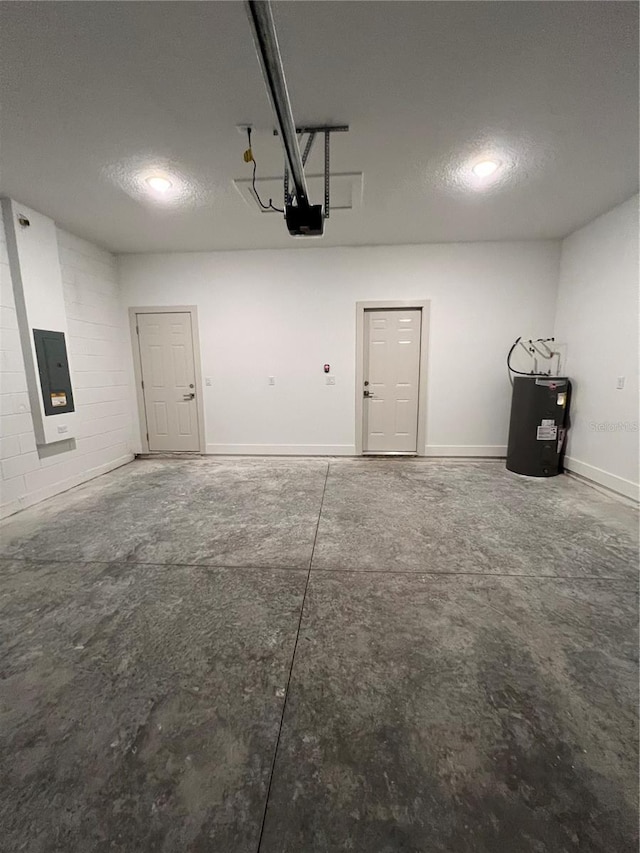 1581 W Saint Elizabeth Pl, Citrus Springs, FL 34434 - garage with electric panel, water heater, a garage door opener, and baseboards