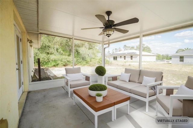 sunroom with an outdoor hangout area and ceiling fan