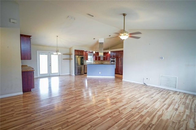 2730 SW 162nd Street Rd, Ocala, FL 34473 - unfurnished living room with a ceiling fan, light wood-type flooring, french doors, and high vaulted ceiling