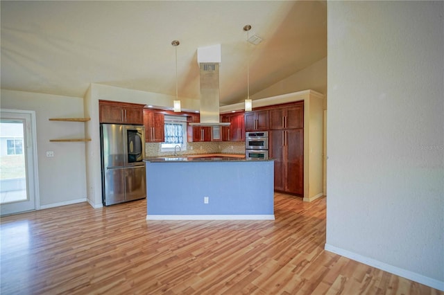 2730 SW 162nd Street Rd, Ocala, FL 34473 - kitchen featuring stainless steel appliances, backsplash, light wood finished floors, vaulted ceiling, and decorative light fixtures