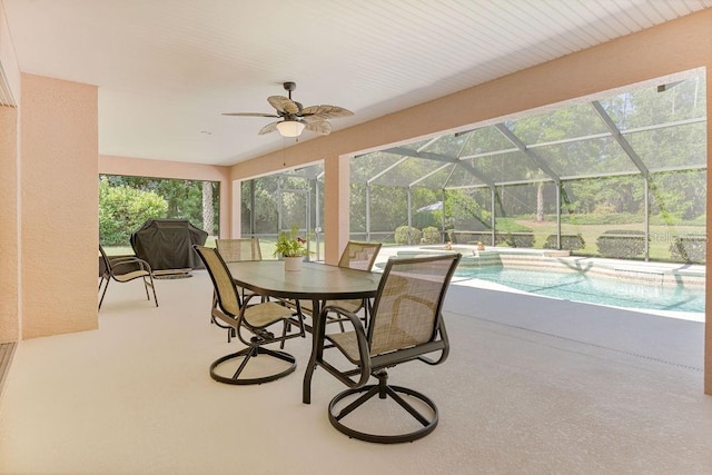 exterior space featuring a pool and ceiling fan