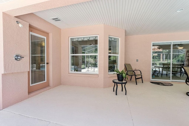view of patio / terrace featuring visible vents