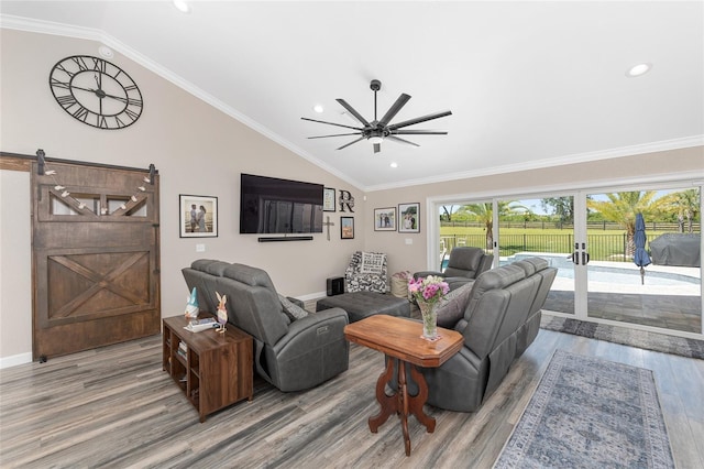9950 NW 11th Ter, Ocala, FL 34475 - living room featuring vaulted ceiling, wood finished floors, a ceiling fan, and recessed lighting