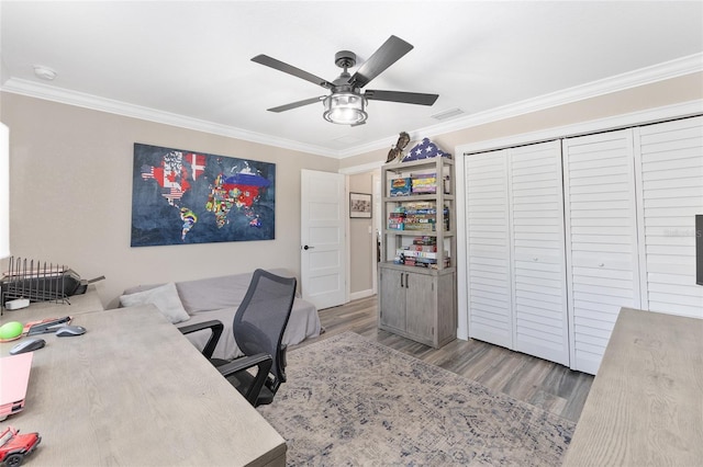 9950 NW 11th Ter, Ocala, FL 34475 - office space featuring ornamental molding, a ceiling fan, and wood finished floors
