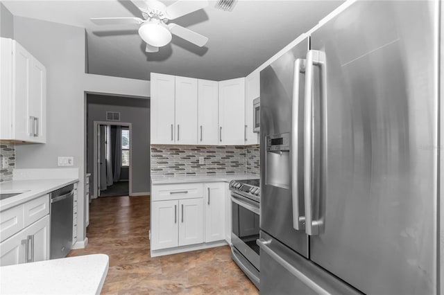 kitchen featuring visible vents, light countertops, appliances with stainless steel finishes, ceiling fan, and white cabinetry