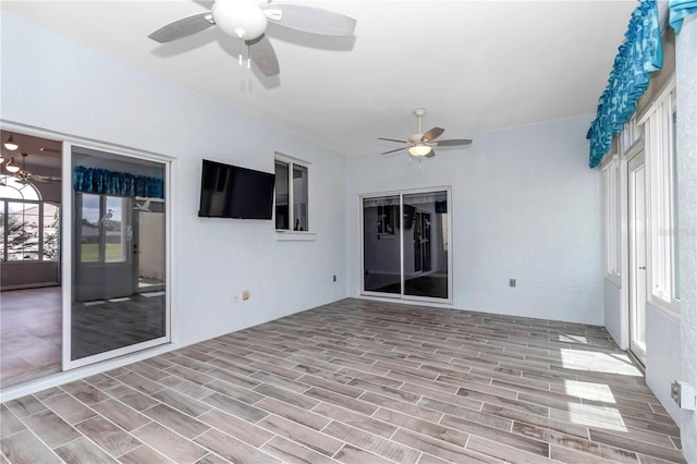 unfurnished sunroom featuring french doors and a wealth of natural light