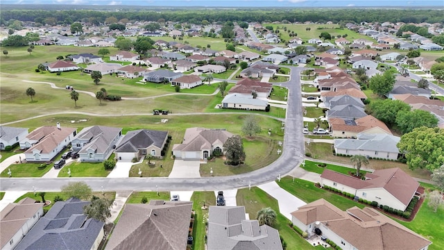 birds eye view of property featuring golf course view and a residential view