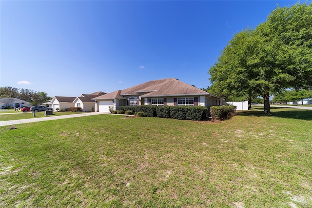 9896 SW 56th Ct, Ocala, FL 34476 - single story home with driveway, fence, an attached garage, and a front lawn